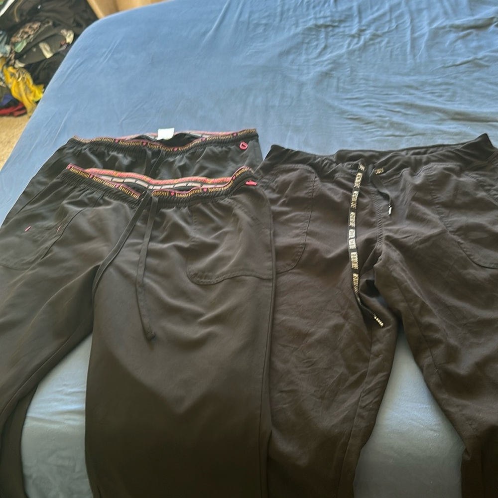 3 scrub bottoms , all size large and black